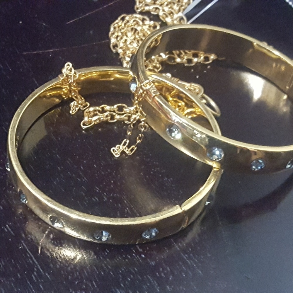 Agent Provocateur gold cuffs